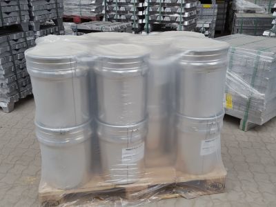Multiple metal pails of SPORAL casting lubricant secured on a wooden pallet for industrial logistics
