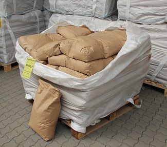 Foundry slag binder SPORLIT by Siegbert Spohr GmbH packed in paper bags inside a big bag on a wooden pallet