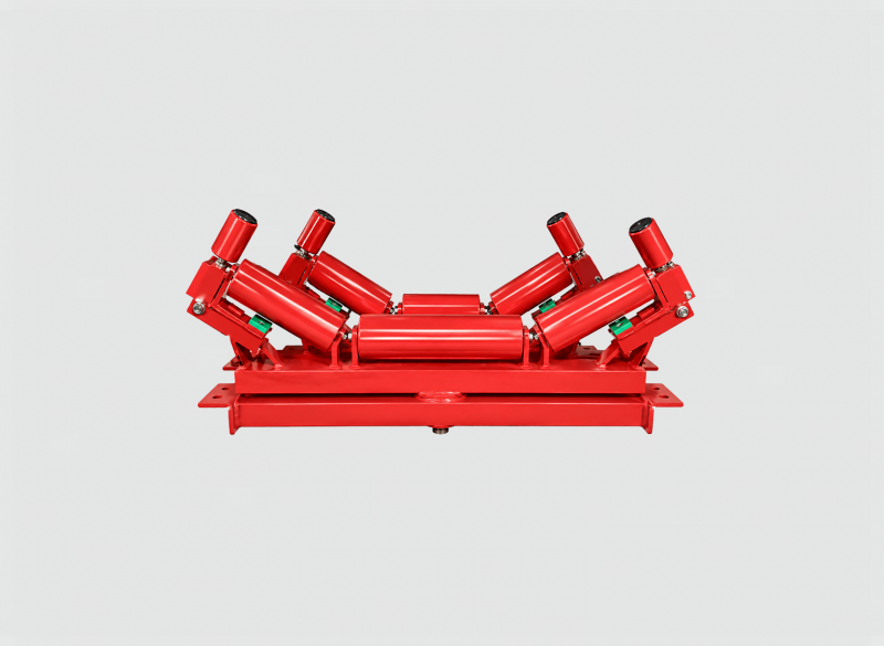 Self-aligning upper belt tracking station designed to correct belt mistracking in the carrying strand