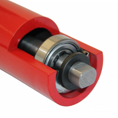 Close-up of a red conveyor roller type hlr showing the machined shaft end and protective dust seal